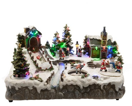 Carillon Villaggio Di Natale LED Con Alberi E Bambini In Movimento 35x18x20cm