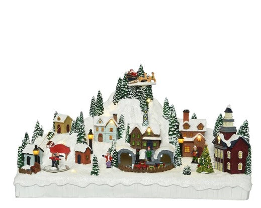 Carillon Natalizio Villaggio Innevato Con Babbo Natale Sulla Slitta