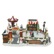 Carillon Natale Parco Giochi Con Pista Di Pattinaggio E Carosello Con Luci E Movimento