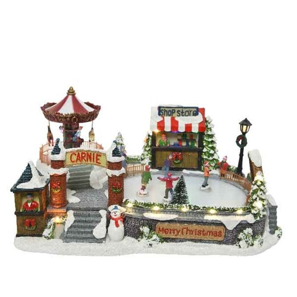 Carillon Natale Parco Giochi Con Pista Di Pattinaggio E Carosello Con Luci E Movimento
