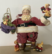 Addobbo Babbo Natale Seduto Con Giocattoli E Animali